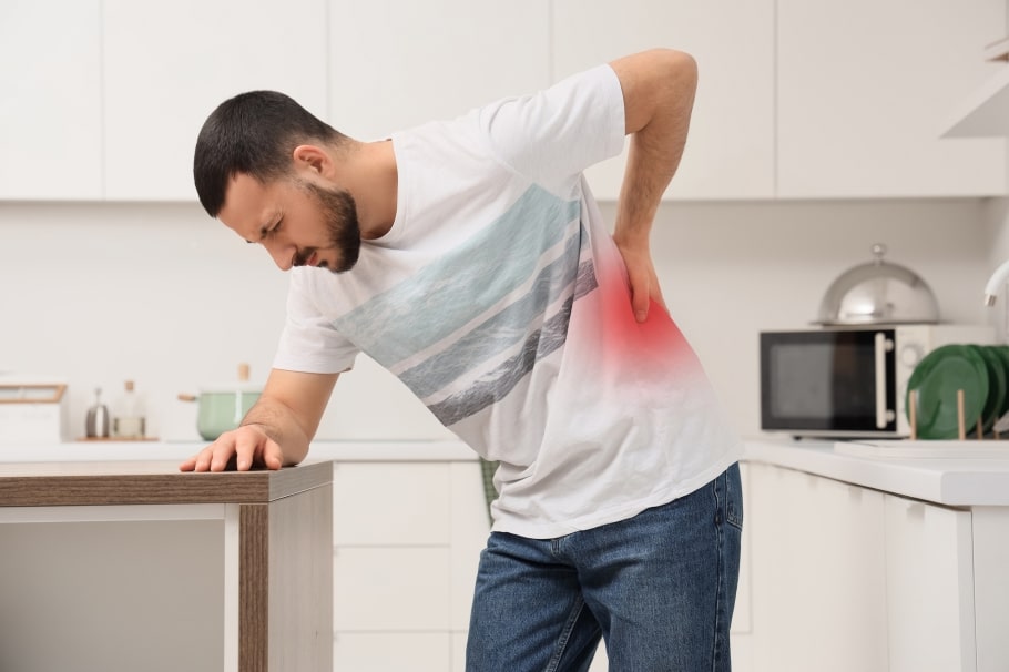 A man suffers from back pain